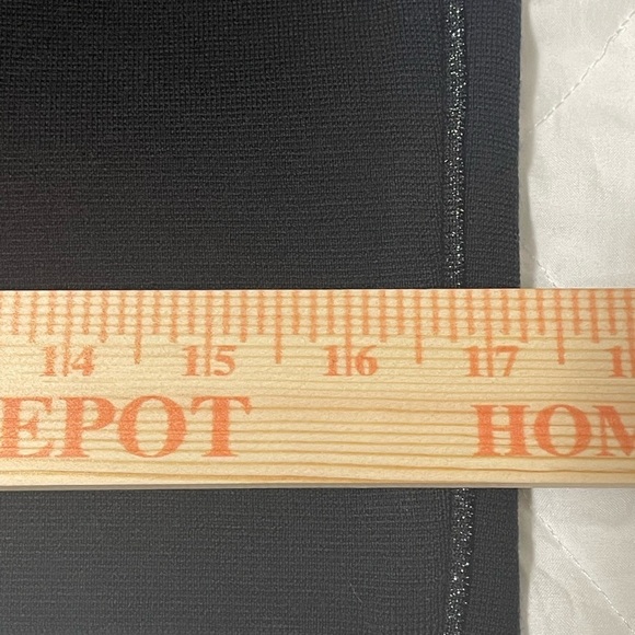 Marc Cain knit black knee length skirt with metallic silver side seams. - Picture 8 of 14